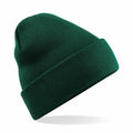 The Beechfield BC045 is a green knit beanie with a rolled-up cuff, showcased against a white background.