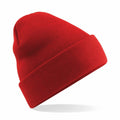A Beechfield BC045 beanie in vibrant red featuring a folded brim, set against a white background.