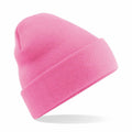 A Beechfield BC045 knit beanie in bright pink, featuring a folded brim, is displayed against a white background.