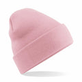 The Beechfield BC045 is a pink knit beanie hat featuring a folded brim, displayed against a plain white background.