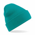 A Beechfield BC045 teal knit beanie hat with a folded cuff displayed against a plain white background.