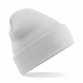 A Beechfield BC045 light gray, ribbed knit beanie with a folded brim is displayed against a plain white background. The hat is positioned at an angle to emphasize its texture and simplicity.