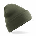 The Beechfield BC045, a green knit beanie with a folded cuff, is displayed against a white background and appears to be floating at an angle.