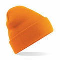 A Beechfield BC045 orange knit beanie with a folded brim, displayed against a white background.