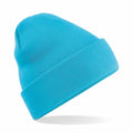 The Beechfield BC045 is a vibrant blue knit beanie hat featuring a folded brim, displayed against a plain white backdrop.