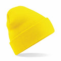 Beechfield BC045 yellow knitted beanie featuring a folded brim, set against a white background.