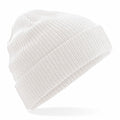 The Beechfield BC050 is a white knitted beanie hat featuring a folded brim, presented on a white background. Its ribbed texture provides a casual and cozy look.