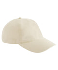 A beige Caps baseball cap featuring a curved brim, six panels, and a button on top, shown against a white background.