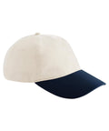 Caps featuring a cream crown and dark navy curved brim, shown against a plain white background.