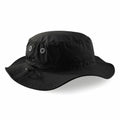 The Beechfield BC088 is a black bucket hat featuring a wide brim and two metal ventilation eyelets on each side.