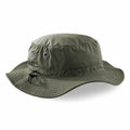 The Beechfield BC088 is a green wide-brimmed boonie hat, featuring two metallic ventilation eyelets on each side and an adjustable chin strap.