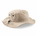 The BC088 by Beechfield is a beige bucket hat, designed with a wide brim, ventilation eyelets, and an adjustable chin strap.