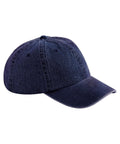 The Caps product is a dark blue denim baseball cap featuring a curved peak, six panels, visible stitching, and a button on top, displayed against a white background.