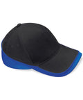 The BC171 by Beechfield is a black baseball cap featuring a blue brim and side accents, seen from the side.