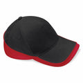 A Beechfield BC171 baseball cap in black and red, featuring a curved brim and adjustable strap.