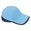 Introducing the Beechfield BC171: a stylish light blue baseball cap featuring a curved visor. This cap boasts a dark blue under-visor and back panel, complemented by white piping along the edges of both the visor and crown.