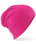 Beechfield BC368 bright pink slouchy beanie with a smooth texture displayed against a white background.