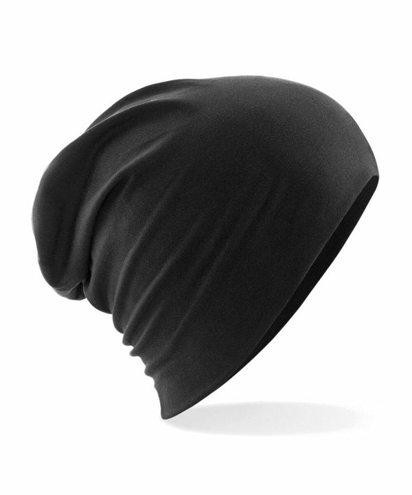 A black Beechfield BC368 hat against a plain white background. The fabric appears soft and slightly wrinkled, creating a casual and relaxed style. The BC368 has a simple and minimalist design.