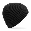 A black Beechfield BC380 beanie hat featuring a ribbed knitted pattern.