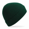 A Beechfield BC380 ribbed knit beanie hat in dark green, shown from a side perspective.