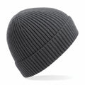 The BC380 by Beechfield, a gray knit beanie featuring a ribbed texture, is displayed angled on a white background.