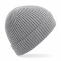 The Beechfield BC380 is showcased against a white backdrop, featuring a gray knitted design with a ribbed pattern. It offers a snug fit and boasts a simple, classic style.