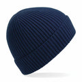 The Beechfield BC380 is a navy blue ribbed knit beanie hat with a folded brim and a simple, classic design, showcased on a white background.
