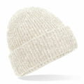 The BC386 by Beechfield is a cream-colored, knitted beanie featuring a ribbed texture and a folded brim, displayed against a white background.