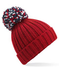 The Beechfield BC390 is a red knitted beanie featuring a multicolored pom-pom on top.