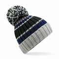 The Beechfield BC392 knit beanie features gray, blue, and black stripes and a pom-pom.