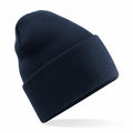 A Beechfield BC40R beanie in navy blue, featuring a knitted design and a folded brim, displayed on a white background.