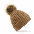 Beechfield BC412 beanie in brown featuring a large faux fur pom-pom on top.