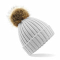 The Beechfield BC412 is a light gray knitted winter beanie featuring a ribbed pattern, a folded cuff, and topped with a large brown faux fur pom-pom.