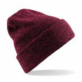 A Beechfield BC425 knit beanie in burgundy, featuring a folded brim, showcased against a white background.
