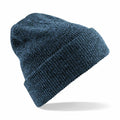 The Beechfield BC425 is showcased against a white backdrop, featuring a dark blue, ribbed knit beanie with a folded cuff that exudes warmth and coziness.