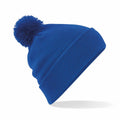 A Beechfield BC426 blue knitted beanie with a pom-pom on top.