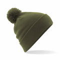 The Beechfield BC426 beanie, featuring a green knitted design with a pom-pom on top, is displayed against a white background.