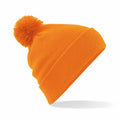 A Beechfield BC426 knit beanie in orange, featuring a pom-pom on top.