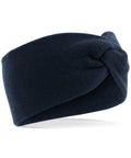 A Beechfield BC432 dark blue knit headband featuring a twisted knot design.