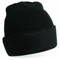 Beechfield BC445 black knit beanie featuring a blank rectangular patch on the front.