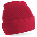 The Beechfield BC445 beanie is a striking red with a folded brim and features a rectangular patch on the front. Its soft and comfortable knit texture makes it perfect for cold weather.