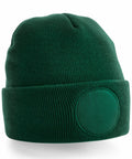 Beechfield's BC446: a green knit beanie featuring a circular patch on the front.