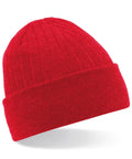 A Beechfield BC447 bright red, ribbed knit beanie with a folded brim, displayed against a white background.