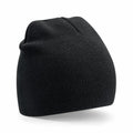 A Beechfield BC44R ribbed-knit beanie in black with a slightly slouched top on a white background.