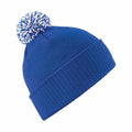 Experience warmth and style with the Beechfield BC450, a blue knitted beanie featuring a ribbed fold-over cuff and a fluffy pom-pom on top.