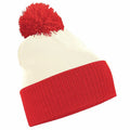 Beechfield's BC451 features a white body and a bright red folded brim complemented by a matching red pompom on top.