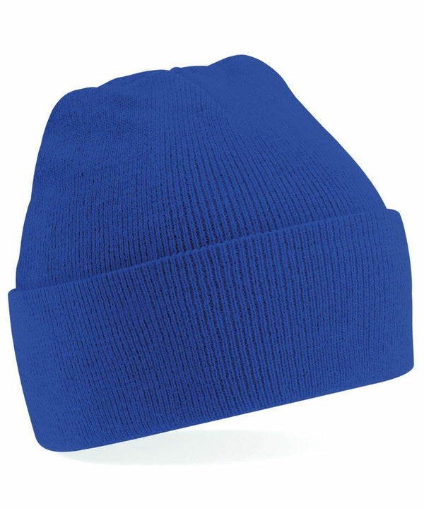 A bright blue knit beanie with a folded brim, the Beechfield BC45B. The texture of the knit fabric is clearly visible, giving a cozy appearance. The beanie is shown against a white background.