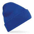 The Beechfield BC45R is a plain blue knit beanie featuring a folded brim, displayed against a white background.
