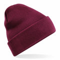 The Beechfield BC45R is a burgundy knit beanie featuring a folded cuff, displayed on a white background.