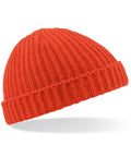 A vibrant red Beechfield BC460 ribbed knit beanie hat featuring a folded brim, set against a white background.